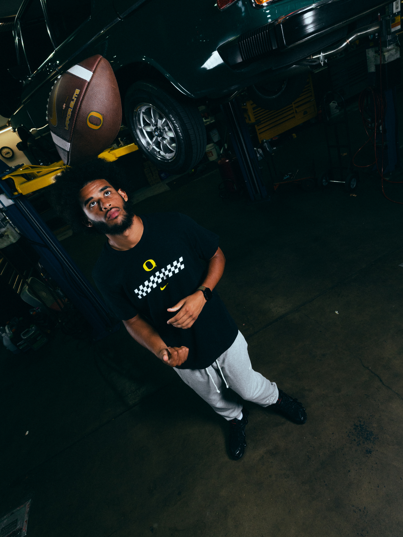 Dante Moore wearing the DOAF Speedway Tee and Pant