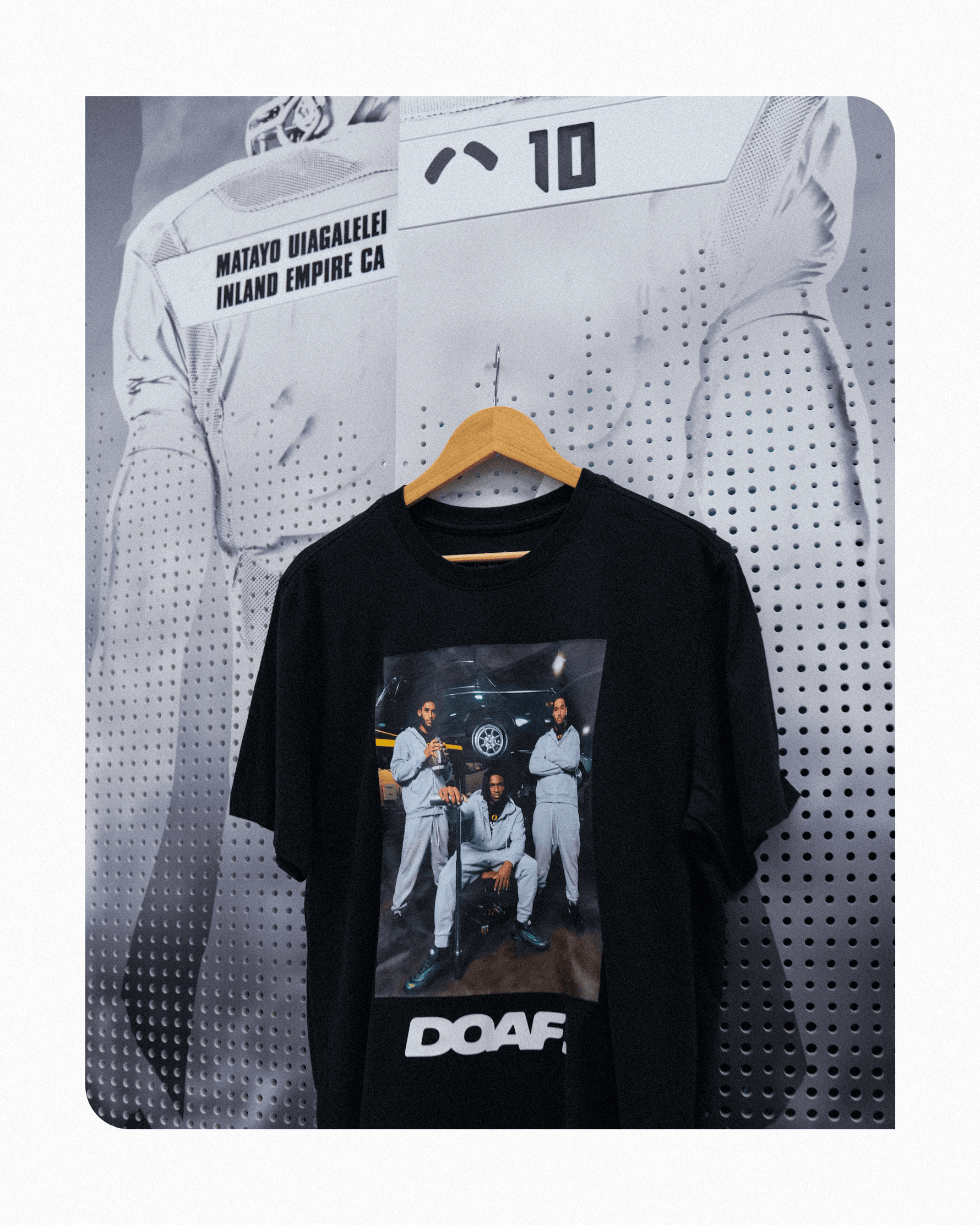 DOAF Tee featuring Dante Moore, Dakorien Moore, and Matayo Uiagalelei hanging up on Matayo's locker. 
