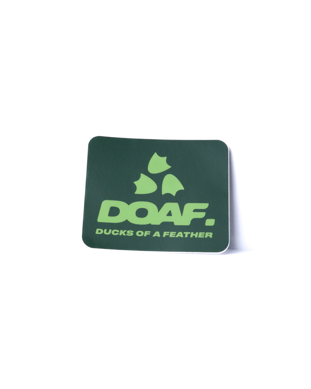 Green and white sticker with 'DOAF' logo on a white background