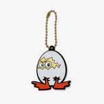DOAF Keychain with cartoonish design of a character in an egg on a white background