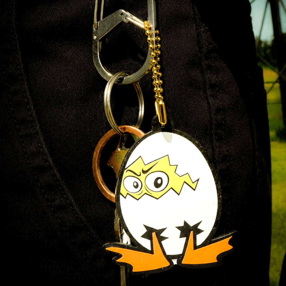 Keychain with cartoon character on a black background