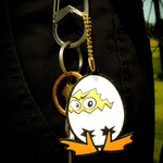 Keychain with cartoon character on a black background