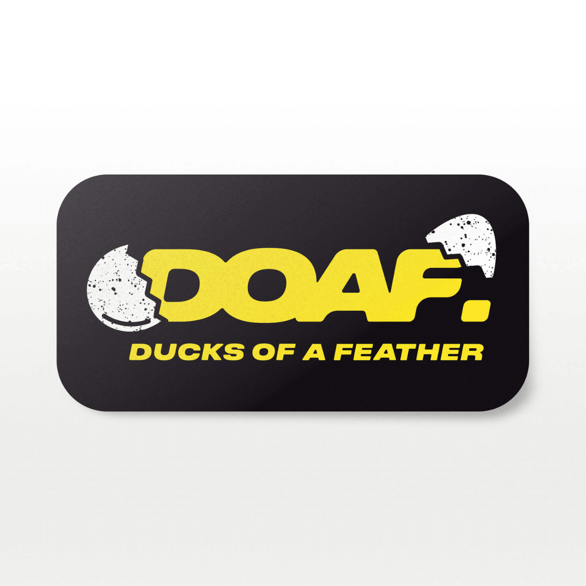 Black rectangular sticker with 'DOAF' and 'Ducks of a Feather' text on a white background with a broken duck egg