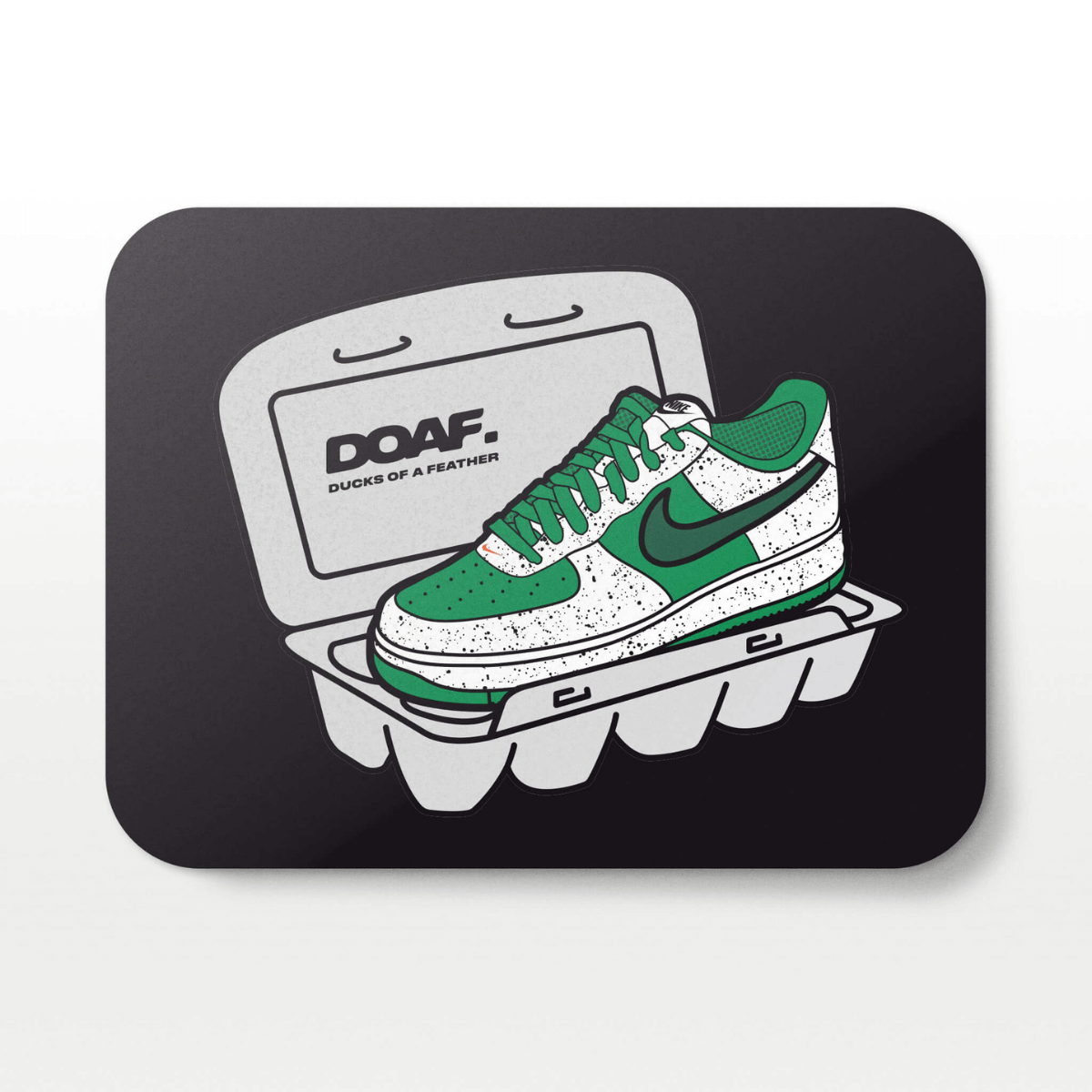 Green and white sneaker in an egg carton with 'DOAF' branding on a black background. 