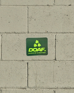 Green 'DOAF' logo on a concrete wall