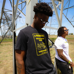 Two men outside wearing DOAF tees
