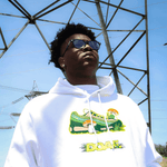 Athlete wearing a white hoodie with a sneaker graphic in front of power lines.
