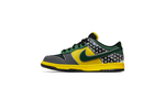 Lateral view of the DOAF What The Duck Nike Dunk Low “Home.” The colorful collage designs also pay homage to Oregon’s innovative use of textures, materials and stitching over the years. Incorporating reflective, metallic and neon elements that helped define Oregon’s distinct look on the field, the shoes both highlight the evolution of the Ducks' uniforms and celebrate the program’s continued impact on sports culture. 